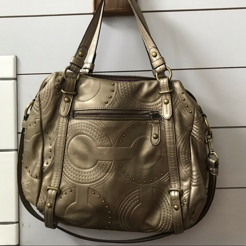 Coach purse -sort of a gold coppery color
